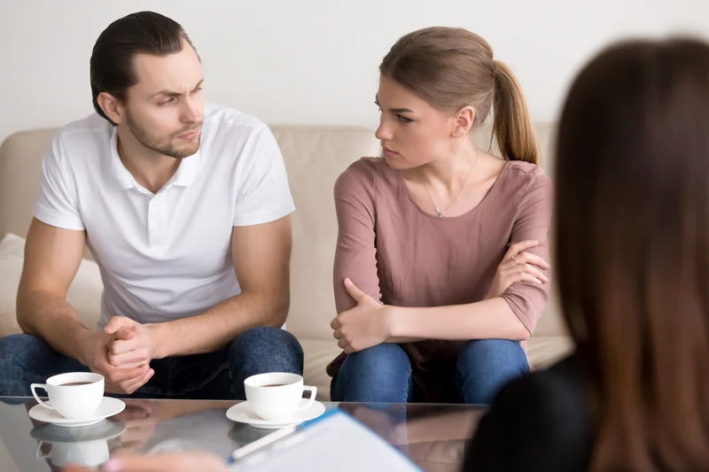 Family members taking part in a counseling conversation.